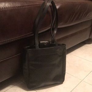 Back Leather purse. Brand is Kathy Ireland.